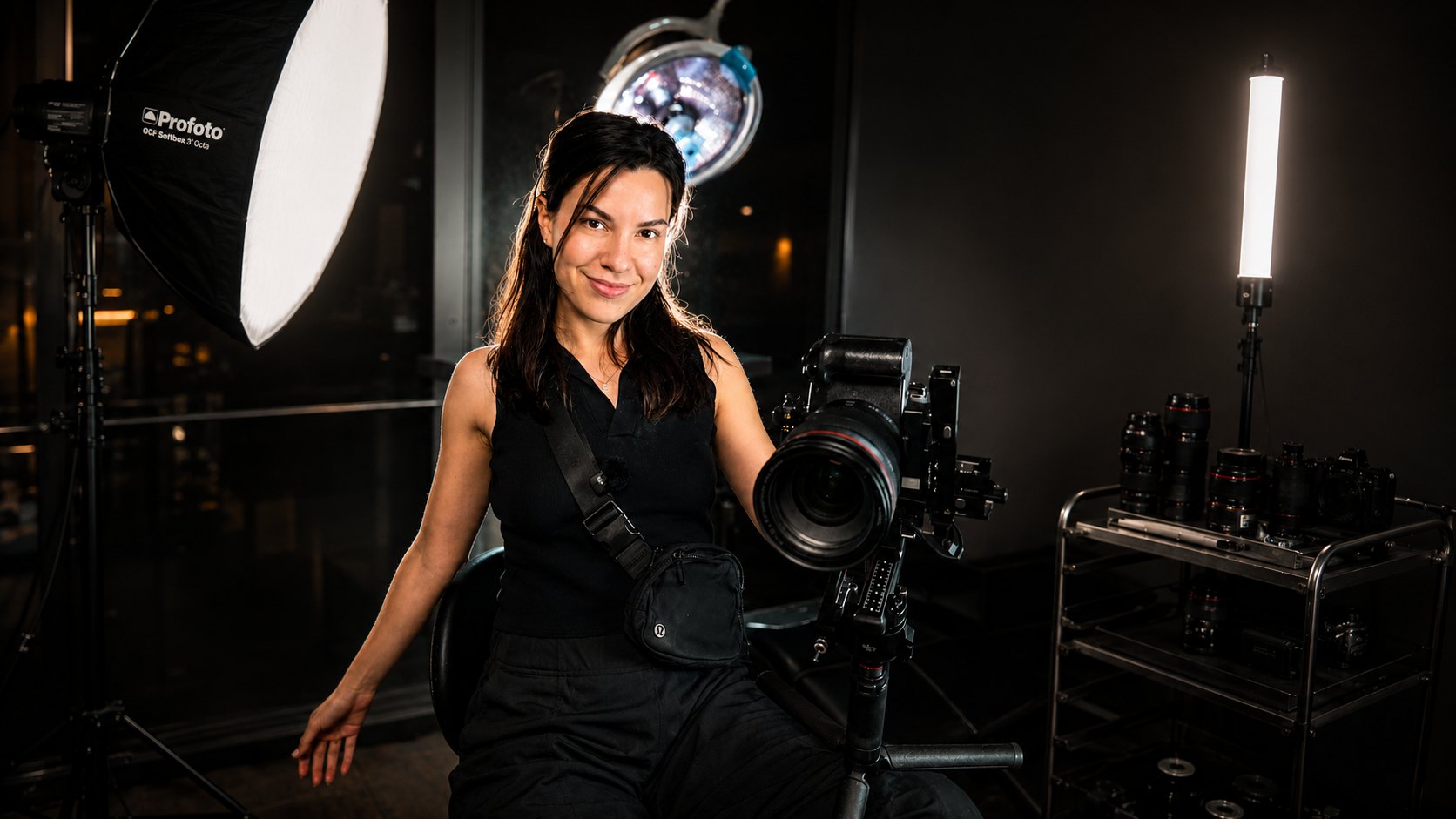 Arina Tann in the studio with her camera and lighting setup