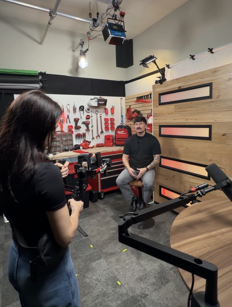 Filming a garage-door company owner on a studio set