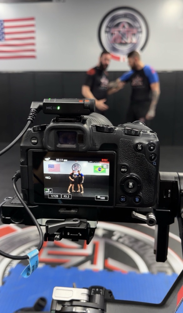 Filming a training session at an MMA gym